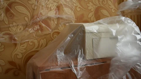 Printer in the room is covered with cellophane Stock Footage 125367444