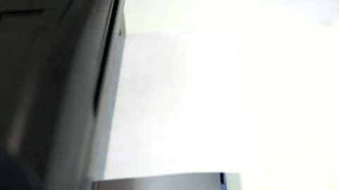 The printer on the table printed the text go to work on a piece of paper Stock Footage 146317930