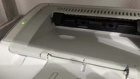 Printer top output area with internal rollers in close up, office printing Stock Footage 337118067