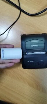 Printer used after the transaction is complete and as tangible evidence. Stock Photos