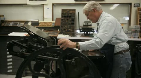 Printer using letterpress Stock Footage 10591665