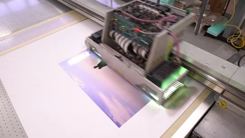 The printer with UV lamps. Top view. The printer works. Polygraphy Stock Footage 88396601
