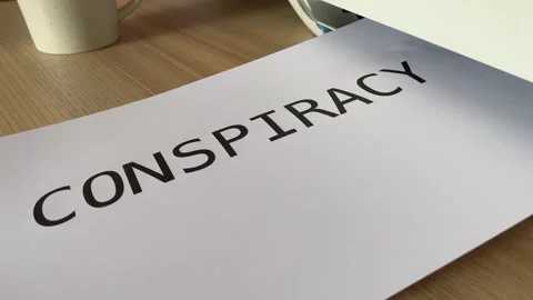 Printing “CONSPIRACY” text written message on paper sheet A4 document Vídeos de archivo 181137245