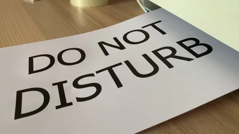 Printing “DO NOT DISTURB” text written on paper sheet A4 document Stock Footage 179570809
