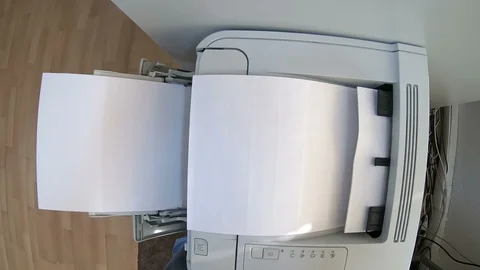 Printing document paper with inkjet laser printer, top view Stock Footage 91474719