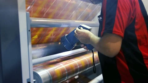 Printing house. Checking the print quality. Printer in the printing house. Stock Footage 235910220