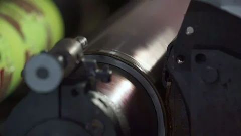 Printing house. Roller machine. Shaft with red paint. Anilox. Color print Stock Footage 204155839