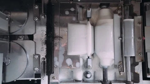 Printing machine, rollers stirred glue. 50fps. Camera motion. Stock Footage 73164329