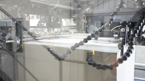 The printing machine takes paper sheets and pulled into the machine Stock Footage 94325995