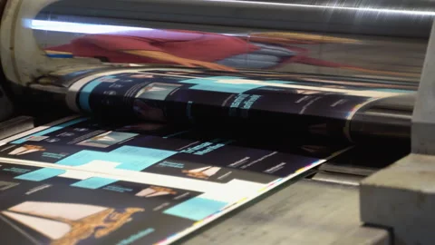 Printing machine works, rolling printed newspaper in typography facility Stock Footage 257031256