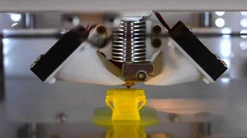Printing on modern 3D printer from hot plastic isolated object close-up. Stock Footage 71412286