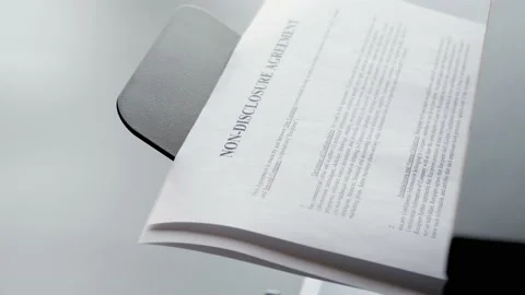 Printing the NDA document. Non-disclosure agreement. 4K footage 스톡 동영상 179968420
