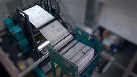Printing Newspaper. Paper Moving on Rolls. Turning. Printing Equipment. Video stock 72000339