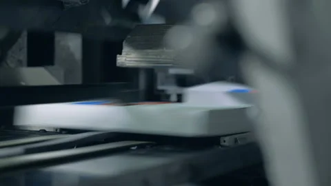 Printing office machine cut off book edges on a line. Stock Footage 113558529