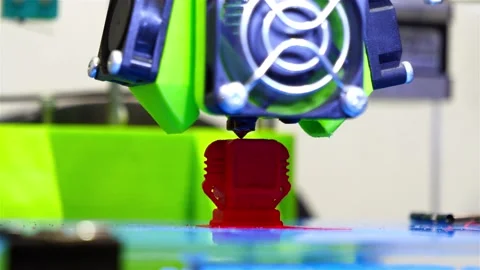 Printing a plastic figurine on a 3D printer Stock Footage 147863144
