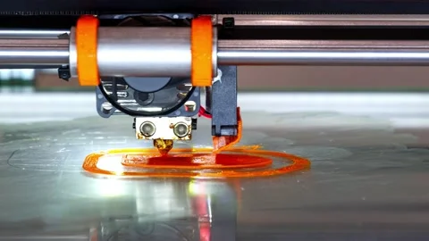 Printing a plastic-polymer part on a 3D printer Stock Footage 164921896