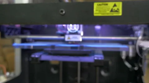 Printing with Plastic Wire Filament on 3D Printer, dolly shot, rack focus Stock Footage 62787048