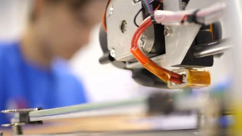 Printing with Plastic Wire Filament on 3D Printer. Three dimensional printer Stock Footage 81223714