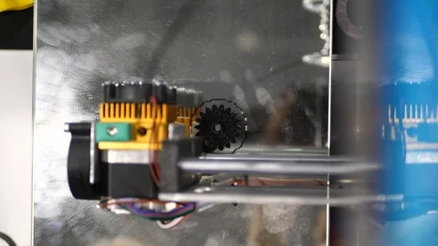 Printing with Plastic Wire Filament on 3D Printer. Three dimensional printer Stock Footage 82546299