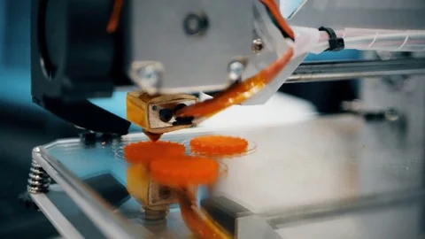 Printing with Plastic Wire Filament on 3D Printer. Three dimensional printer Stock Footage 82546433