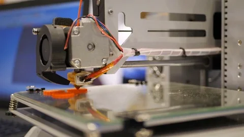 Printing with Plastic Wire Filament on 3D Printer. Three dimensional printer Stock Footage 82546468