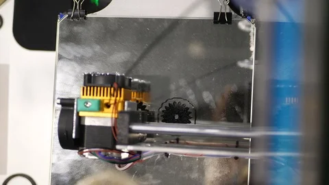 Printing with Plastic Wire Filament on 3D Printer. Three dimensional printer Stock Footage 82556290