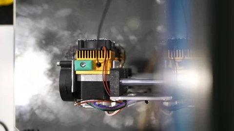 Printing with Plastic Wire Filament on 3D Printer. 3D plastic printer, 3D Stock Footage 82556346