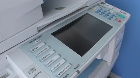 Printing of printer with officer is pressing select button print Stock Footage 45395806