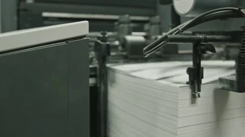 Printing process - feeding sheets of paper, polygraph industry Stock Footage 69091237