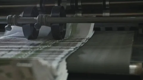 Printing Process on polygraph industry - brochures moving on the conveyor belt Stock Footage 69111937