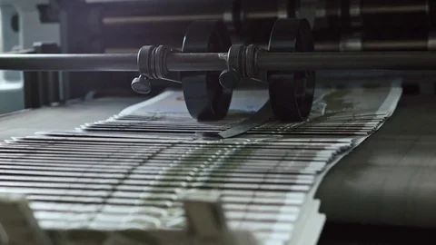 Printing Process on polygraph industry - brochures moving on the conveyor belt Stock Footage 74442489