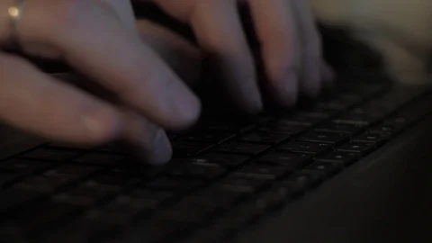 Prints on a laptop Stock Footage 102349076