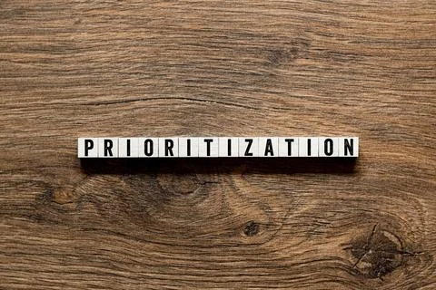 Prioritization - word concept on building blocks, text Stock Photos