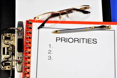 Priority plan in a folder-a concept that shows the importance, primacy, Stock Photos