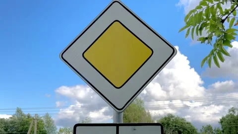 Priority-road-sign-blue-sky Stock Footage 341854837