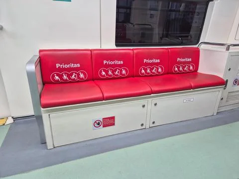 Priority seating area with red leather chairs Stock Photos