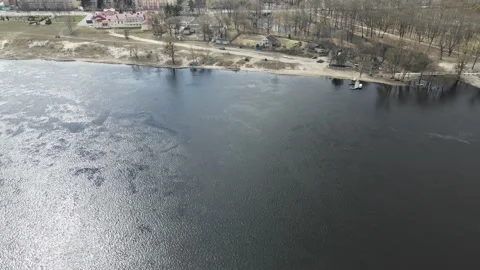 The Pripyat River flows in the town of Narovlya at spring. Belarus. Stock Footage 160686901