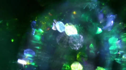 Prism and green bokeh.light reflections in shades of green. 스톡 동영상 329388340