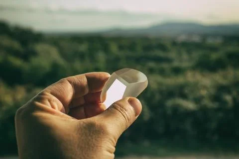 Prism in hand Stock Photos