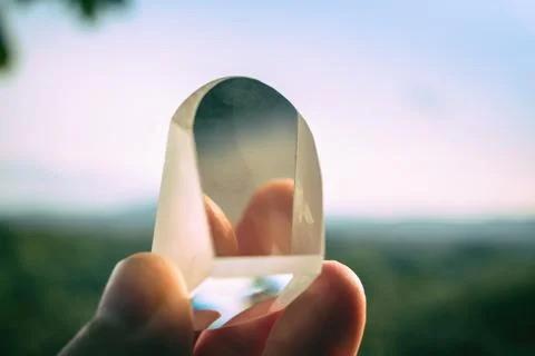 Prism in hand Stock Photos