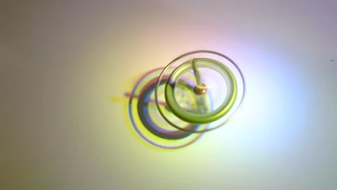 Prismatic Spin: Mesmerizing Gyroscope in Motion Stock Footage 302943144