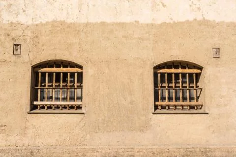 Prison with bars on the windows Stock Photos