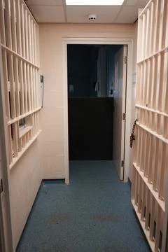 Prison Cell Bars And Open Door In A Corridor At Shrewsbury Prison, England. Stock Photos