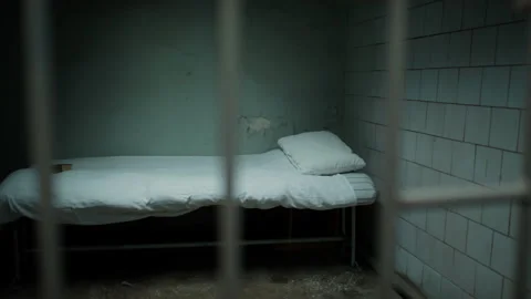 Prison Cell with Bible on Bed Video stock 263250885