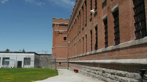 Prison Cell blcok exterior wide Stock Footage