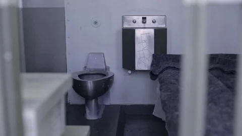 Prison cell door closing Stock Footage