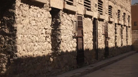 Prison Cell Doors and old ruined wall of Cairo Citadel Police Museum Egypt Stock Footage 341455350
