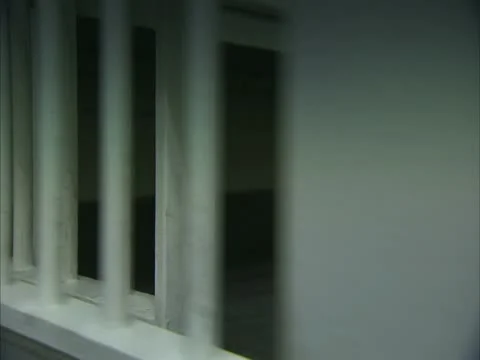 Prison cell doors closing Stock Footage 11401908