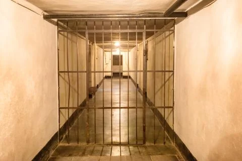 Prison cell with iron bars Stock Photos