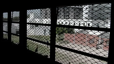 Prison Cell Window Overlooking Inmates Playing Soccer in Yard, Olmos Prison, 4K Stock Footage 278107176